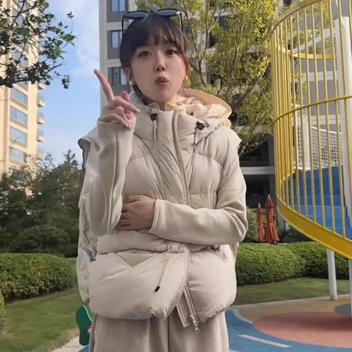 Chaleco de algodón de pluma corto encapuchado invierno nuevo 2025 coreano relajado de alto nivel chaleco pequeño chaqueta de hombro