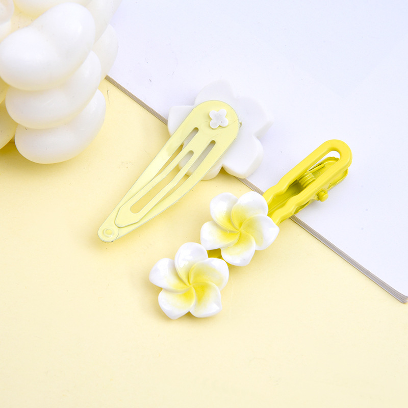 Arylic Material Plumeria Pattern Kid'S Gender Cute Simple Style Streetwear Kid'S Plumeria Arylic Stoving Varnish Hair Clip Hair Tie