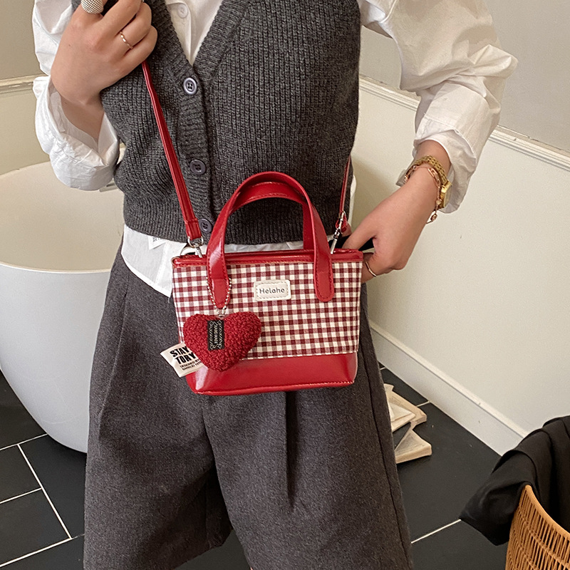 Bolsas infantiles de comercio exterior transfronterizo pequeñas bolsas frescas de amor colgante bolsas de cubo de mano lindas bolsas de hombro de niñas