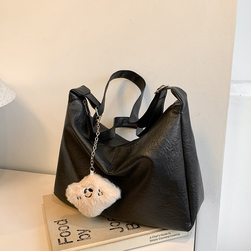 Bolso de moda coreano de gran capacidad para mujeres 2024 nuevo invierno simple exportación bolsa de viaje bolsa de hombro universal