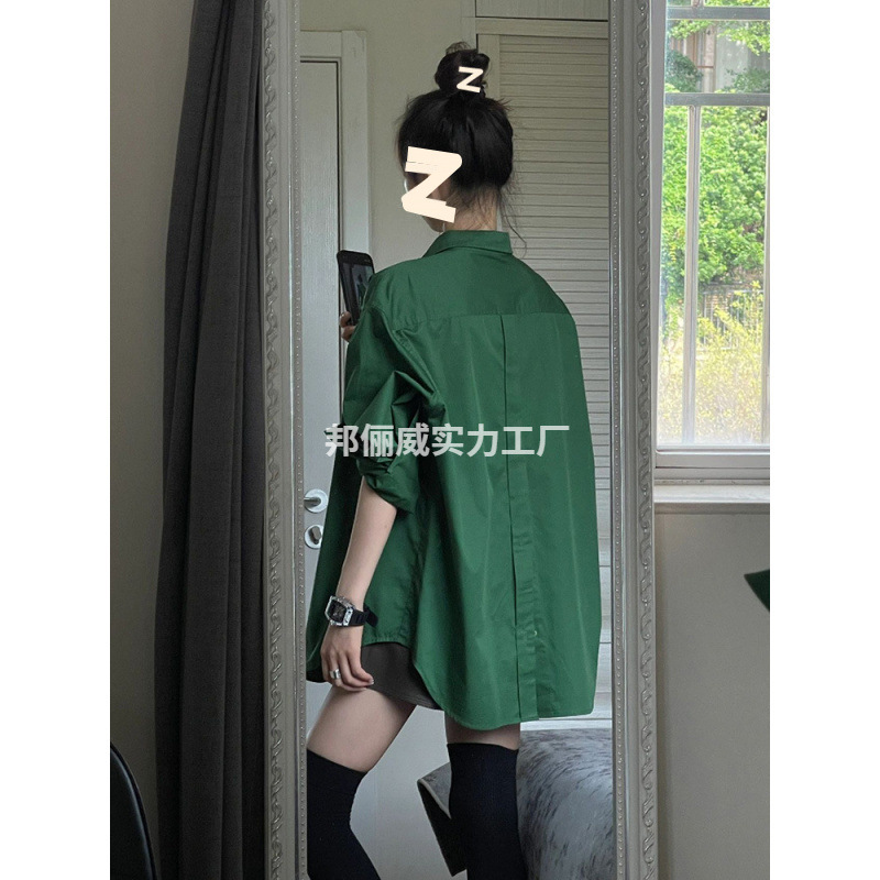 绿色中长款宽松衬衫女春秋季2025新款时尚洋气别致下摆不规则上衣