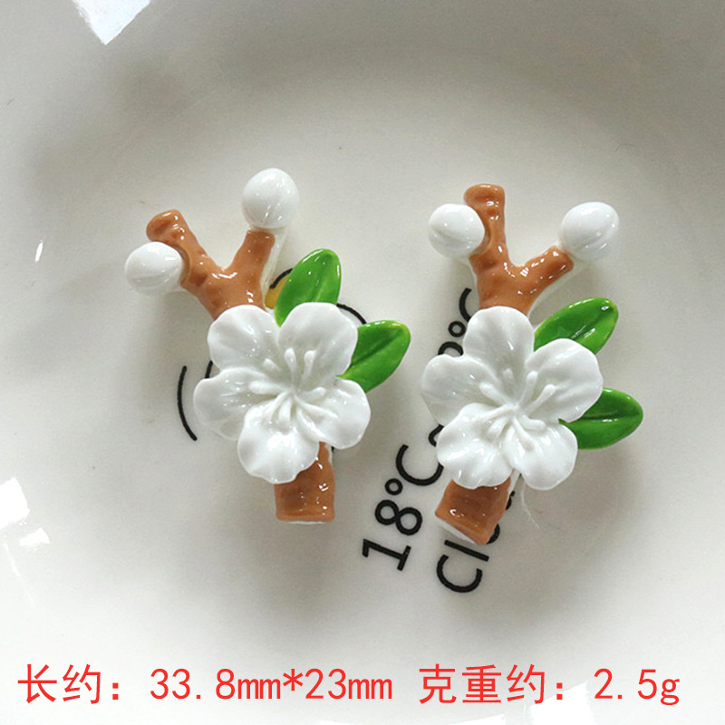 Nuevos accesorios de bricolaje de flor de durazno de resina rosa, zapatos con agujeros de pegamento de crema, fundas para teléfonos móviles, accesorios para el cabello, material de imán para refrigerador al por mayor