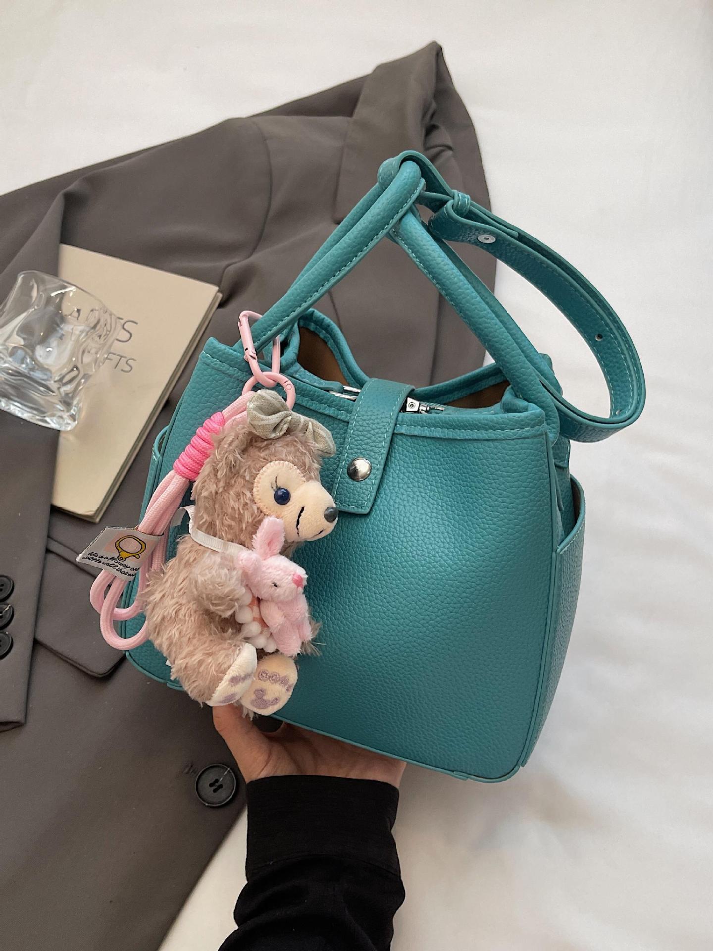 Venta caliente de comercio exterior bolso de cubo de verano mujer 2025 bolso de canasta de verduras de mano nueva tendencia bolso de mensajero de alta gama de todos los partidos