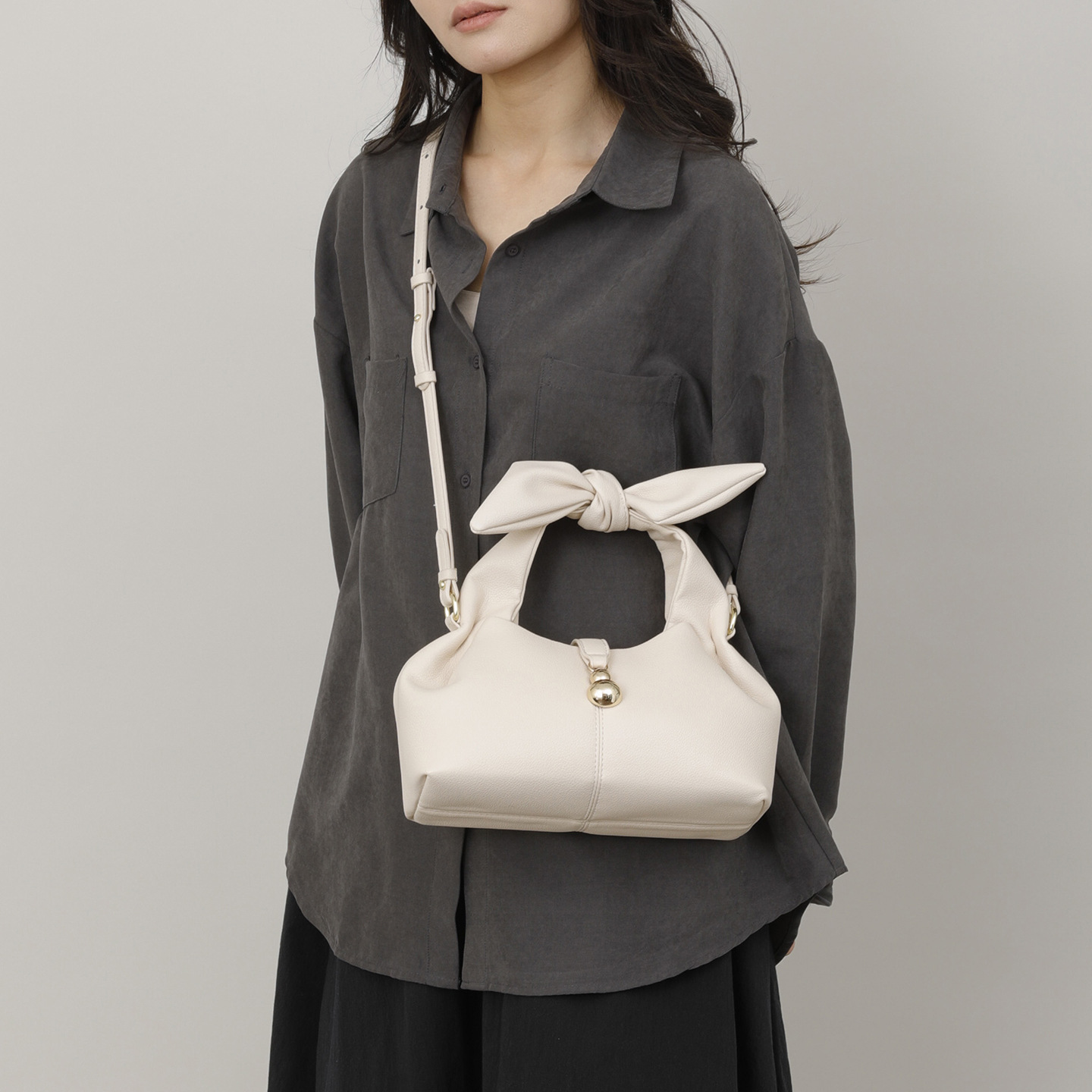 Coreana retro nicho nubes bolsas de mujer arco universal bolsas de mochila diarias de viaje de moda bolsas de hombro bolsas de bolsas de bolsas