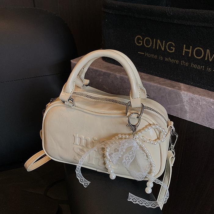 Versión coreana del bolso de bolos de mano para mujer 2025 nuevo bolso de hombro de moda de moda bolso de mensajero popular casual de todo fósforo