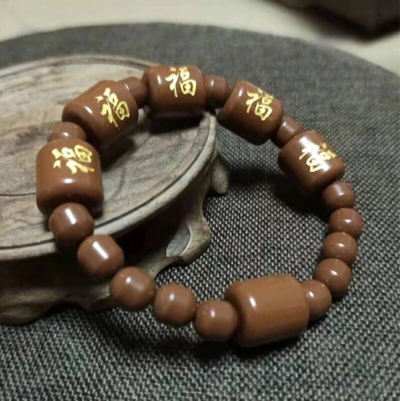 Tomalin Bracelet Bright Curry Color Carved Jinfu Character Cylindrical Fashion Bracelet Sold Gift