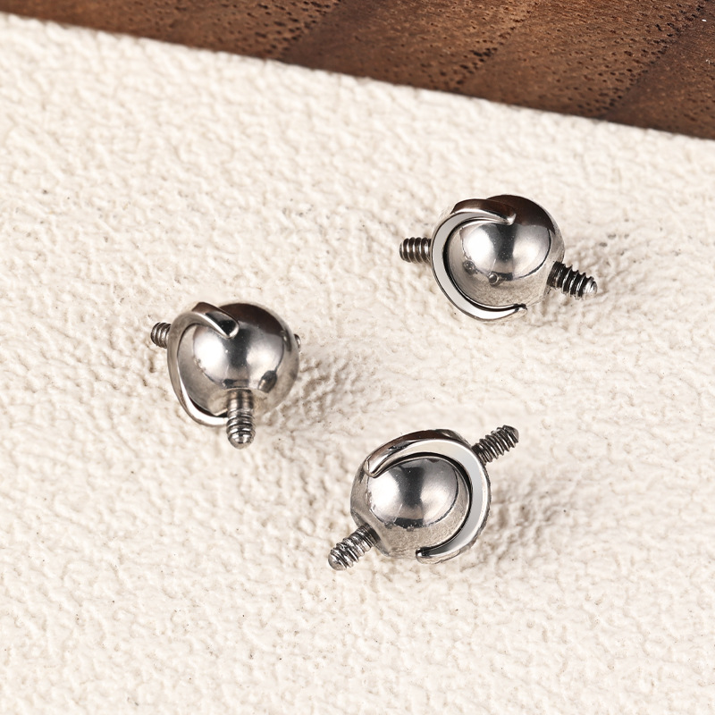 Silver pointed spike labret stud material detail