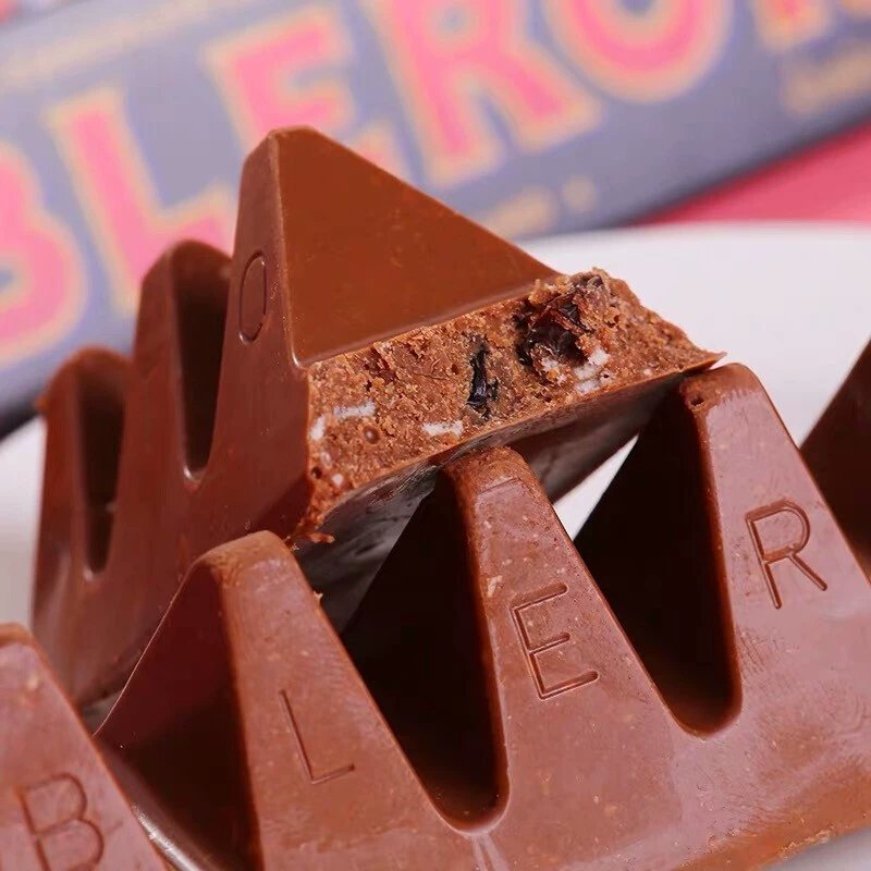 Импортированный треугольный шоколад Toblerone (Toblerone) 100 г — assorted вкусы: молочный, тёмный, белый, солёный