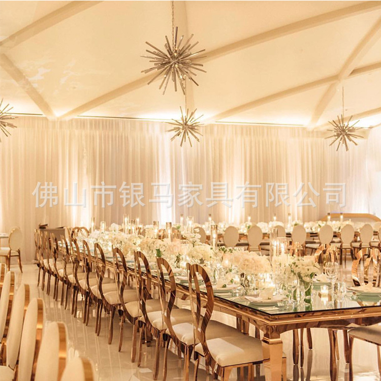 Fábrica al por mayor Hotel banquete boda comedor silla boda galvanoplastia Silla de acero inoxidable Bolsa De Oro suave Silla de comedor de cuero