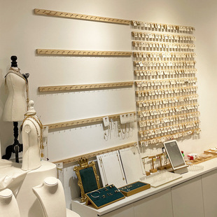 Small jewelry display rack wall clothing shop special children's underwear earrings earrings hanging wall socks rack