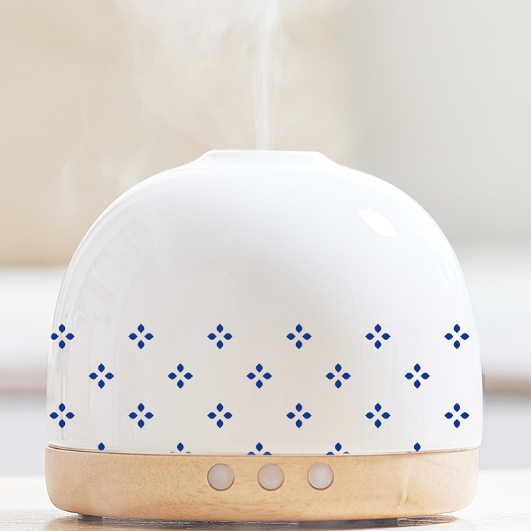 Fabricante al por mayor Guochao Wenchuang regalo creativo 300ML máquina de fragancia de madera sólida cerámica auto-expandir aceite esencial humidificar