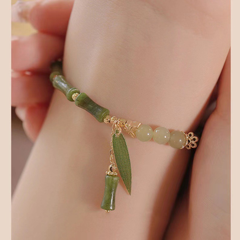 A retro Chinese-style olive jade bamboo joint bracelet for women, with a unique design and simple charm. A new Chinese-style Hetian jade bracelet for women, 253 undefined