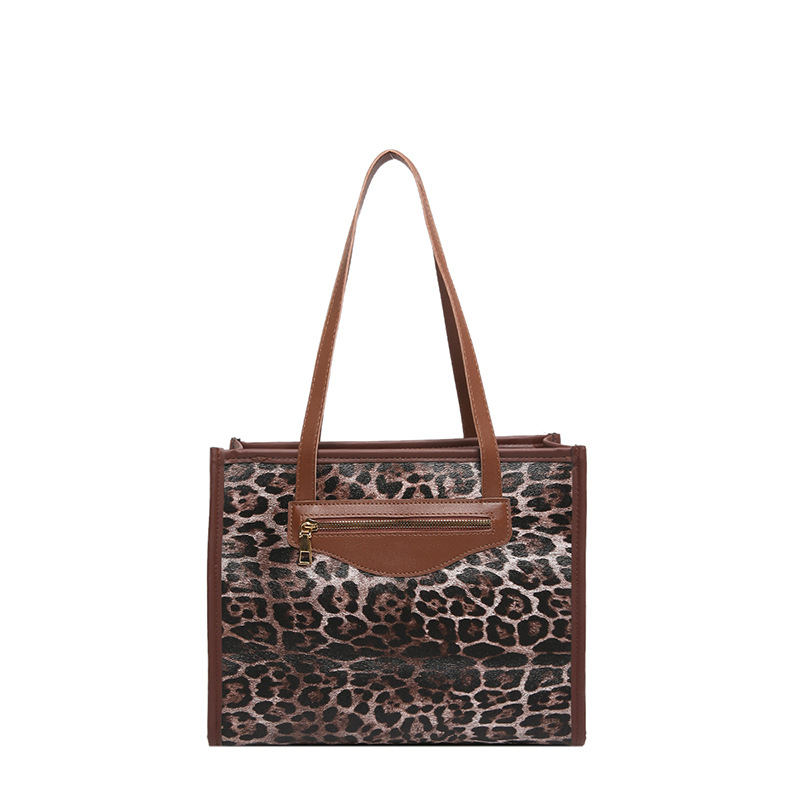 Bolso de gran capacidad de moda de leopardo para mujeres 2024 nuevo estilo de moda de viaje tote nicho diseño de hombro mochila