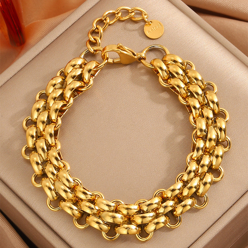 Moda transfronteriza europea y americana pulsera gruesa de twist de acero inoxidable personalidad de las señoras pulsera que no se desvanece todo fósforo joyería de alta calidad image 1