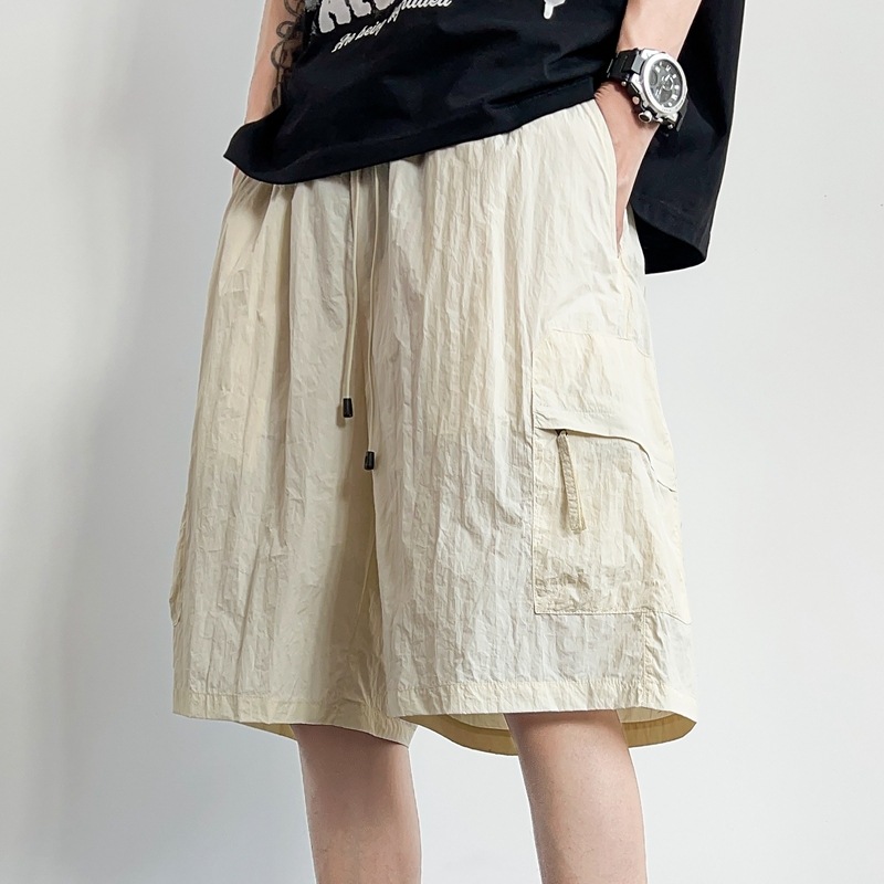 S - 5XL tamaño más grande pantalones de nylon de cinco puntos de hielo seco rápido pantalones cortos de hielo de playa de hombre pantalones casuales delgados pantalones de protección solar hielo