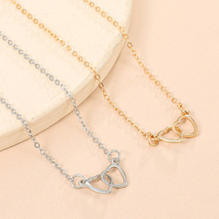 Cross-border minimalist heart-shaped anklet for women, featuring a unique, elegant design with interlocking hollow heart motifs—perfect as beach-style foot jewelry, available wholesale.