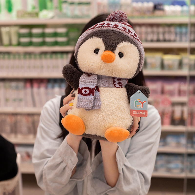 Nuevo creativo lindo invierno muñeca pingüino mochila muñeca de dibujos animados pingüino muñeca de niños almohada agarrar muñeca lote