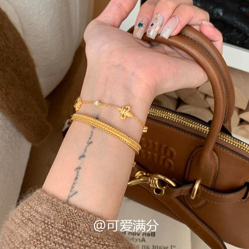 「金玉良縁」中古の金色のアイリスのブレスレットの高い顔の値は少しジルコンを入れてプレゼントします。|undefined