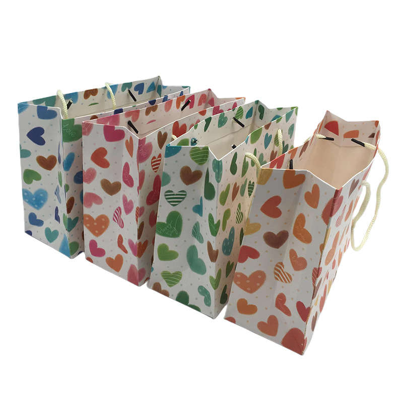 现货4色心形礼品袋可印刷图案购物袋白卡牛皮袋手提袋红酒袋