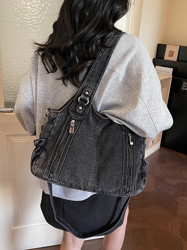 Bolsas de tendencia transfronteriza de gran capacidad para mujeres 2026 primavera nuevo retro jeans mochila de viaje simple tote