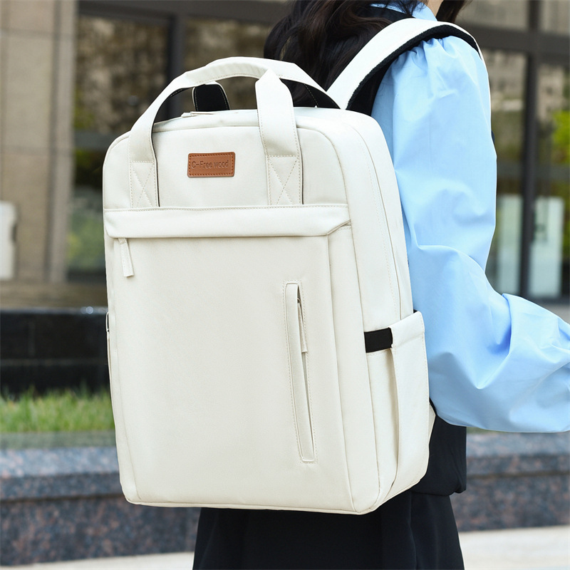 Populair nieuw model studentenrugzak, draagbare laptoptas, multifunctionele opbergruimte, effen kleur, eenvoudig ontwerp_voghion.com