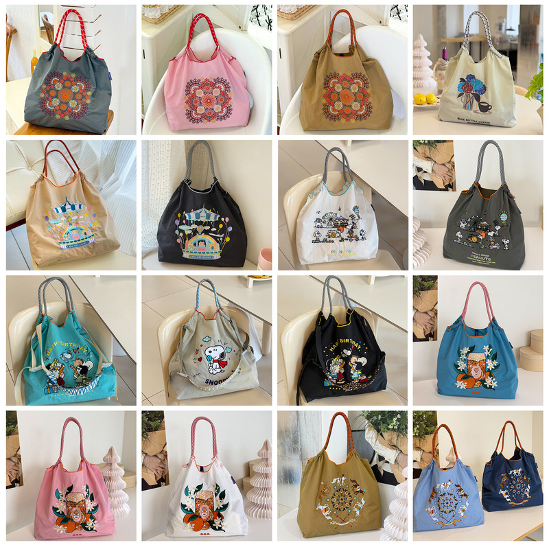 New ballchain bag with cartoon embroidery, large-capacity portable casual commuter handbag and shoulder bag New ballchain bag with cartoon embroidery, large-capacity portable casual commuter handbag and shoulder bag