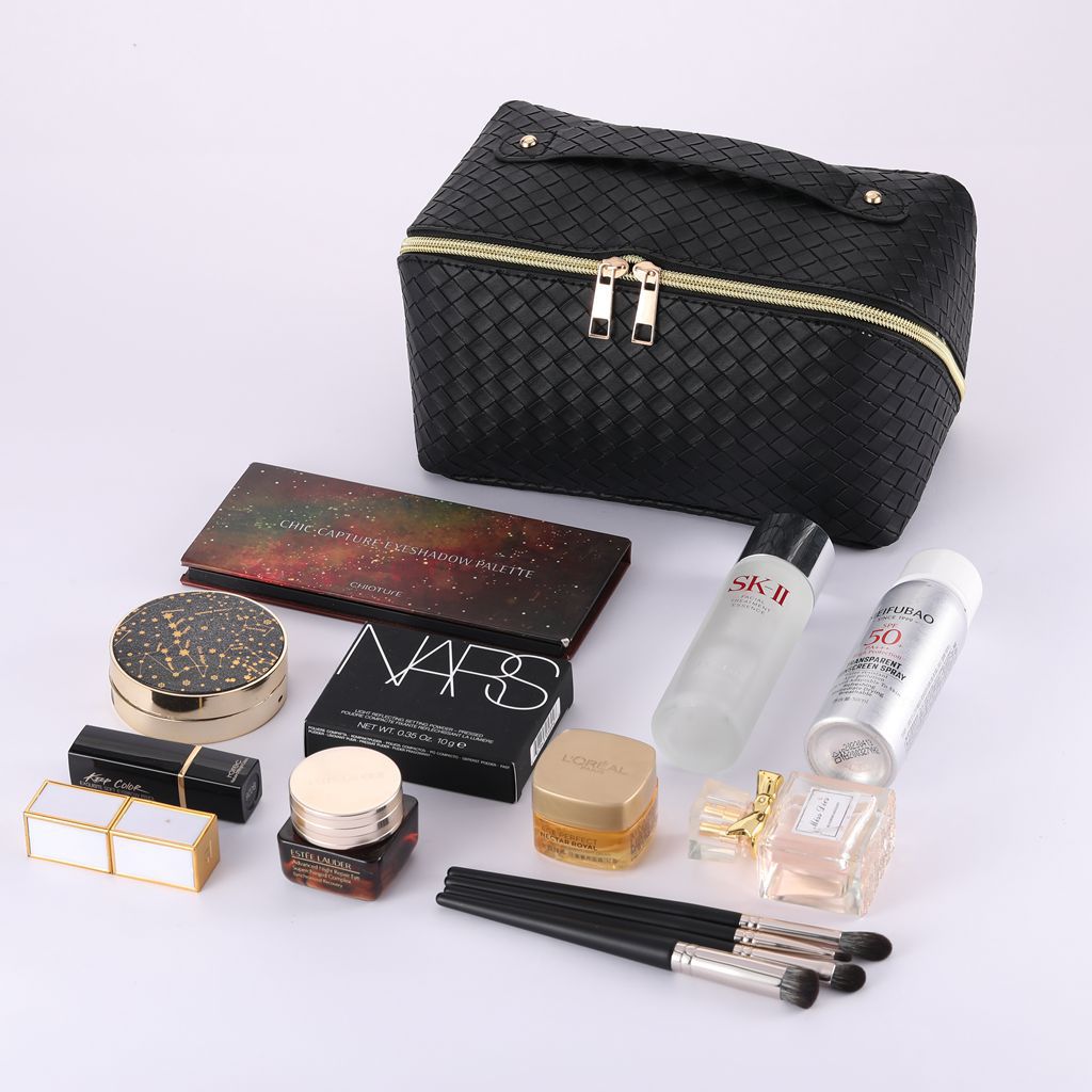 Bolsa de cosméticos de almohada tejida transfronteriza bolsa de almacenamiento de viaje portátil de gran capacidad portátil de cuero