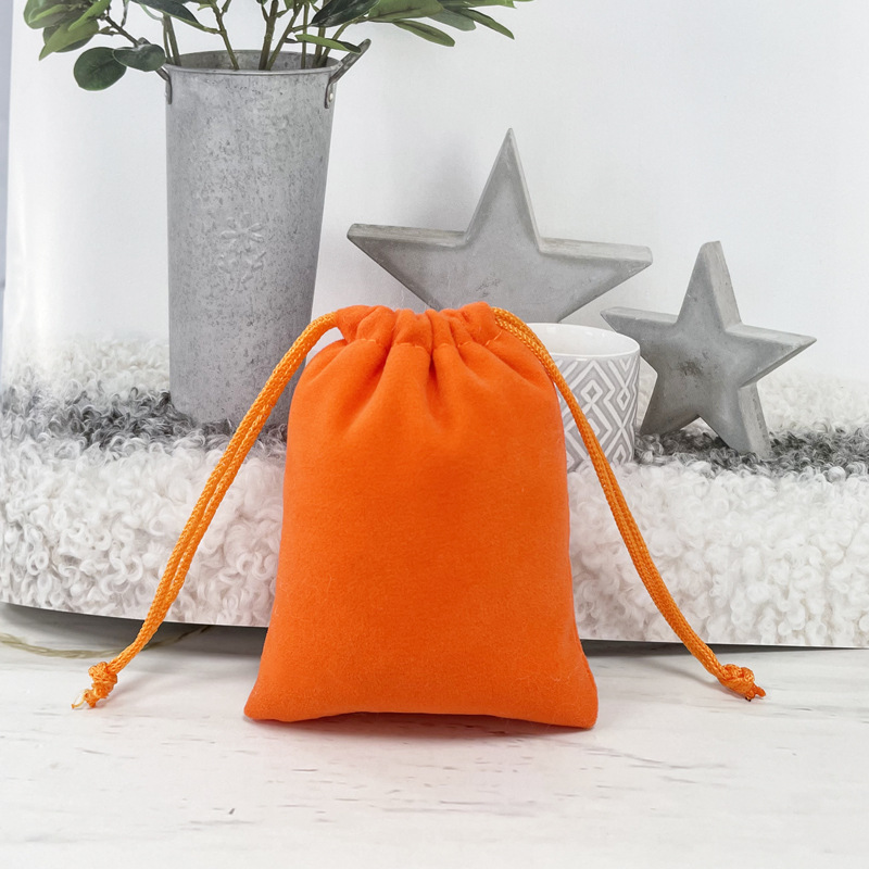 Bolsa de franela de joyería al por mayor venta directa de fábrica de cosméticos auriculares banco de energía a prueba de polvo almacenamiento bolsillo de cordón de joyería