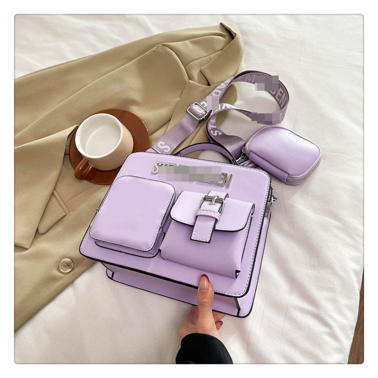 Bolso de moda de estilo europeo y americano 2025 primavera nuevo estilo simple y atmosférico bolso de letras cinturón de hombro ancho bolso de mensajero de un solo hombro