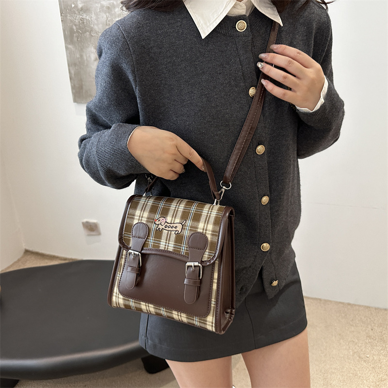 Mochila de moda para mujeres nicho de diseño portátil bolsas escolares coreanas retro ocio moda mochila de viaje ligera