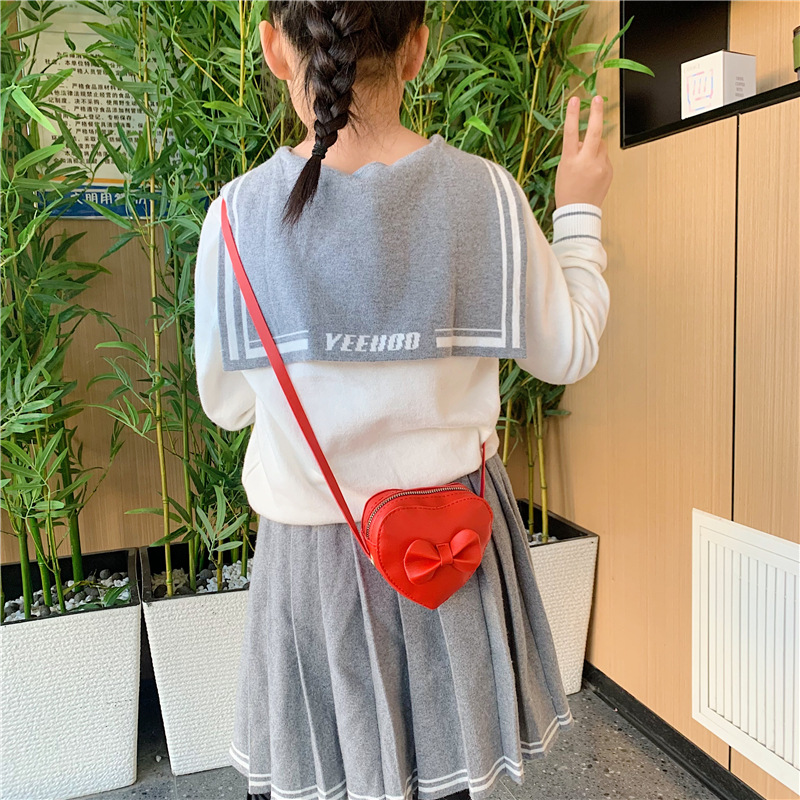 Dulce amor modelado niña pequeña bolso de hombro de dibujos animados arco bebé mochila 2026 nuevo bolso para niños