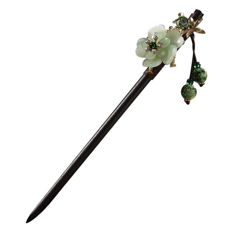 Древний стиль волос с кисточками и кисточками