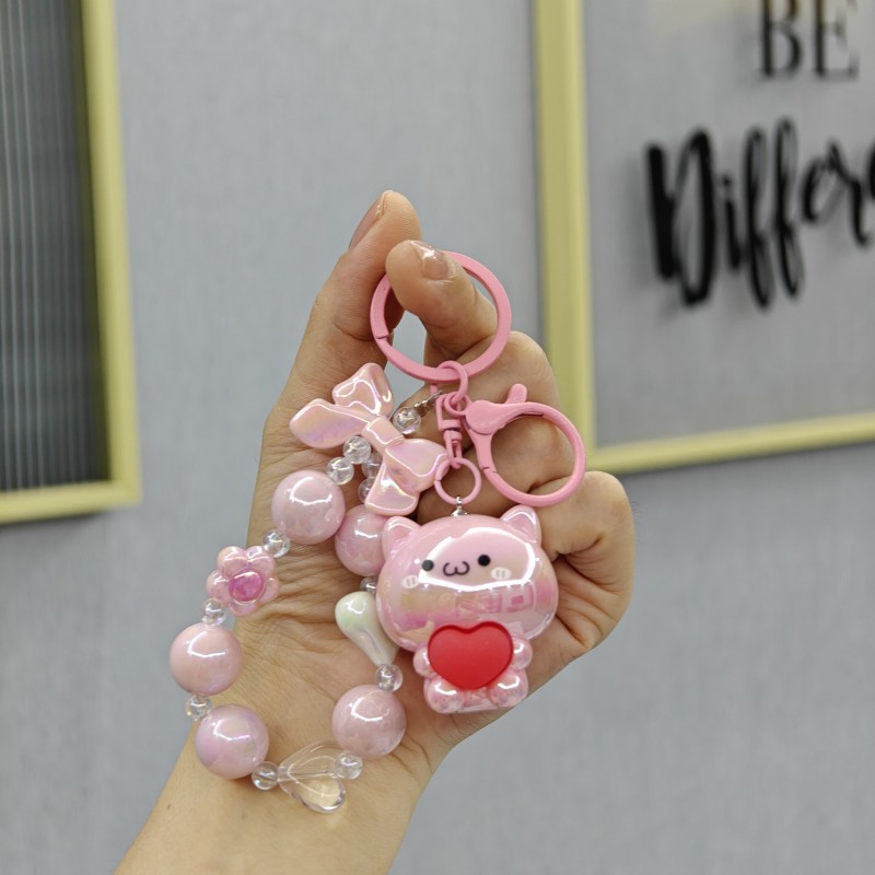 Galvanoplastia abrazo amor oso con cuentas llavero colgante acrílico muñeca colgante garra máquina muñeca regalo al por mayor