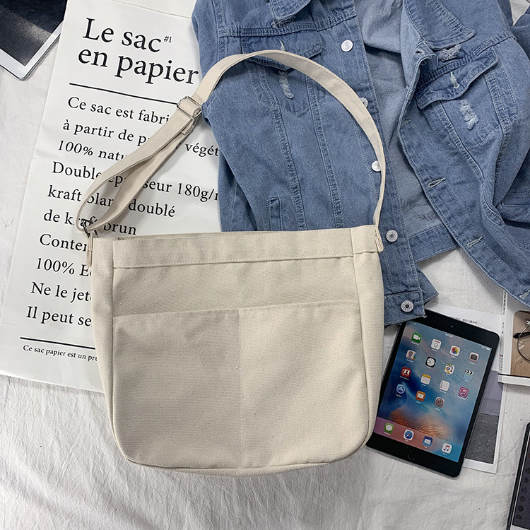 2024 nuevo estilo estilo estilo perezoso bolso de lona de mensajero de color sólido en blanco bolso escolar de estudiante bolso de hombro de estilo universitario ins
