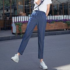 天糸のジーパンの女性の夏の薄い金のハロンの9分のズボンは腰を緩めます。