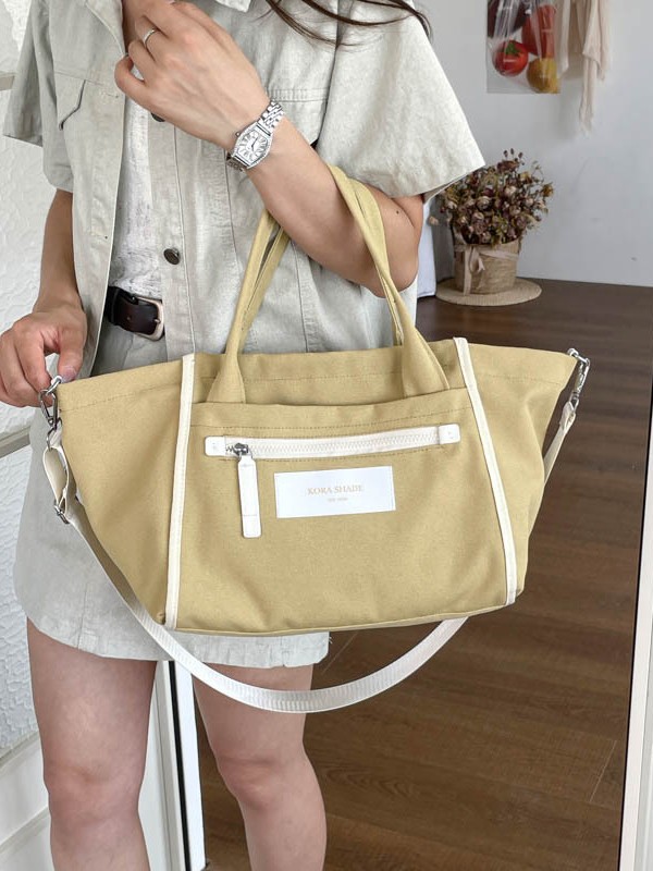 Bolso de lona de gran capacidad para mujeres 2026 nuevo tipo de mochila de hombro simple y casual para la clase de la bolsa de viaje