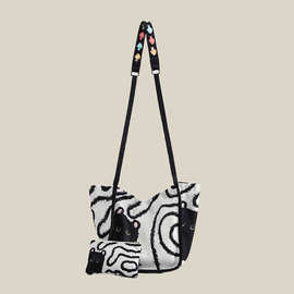 复古时尚高级感帆布包包女2025新款可爱卡通小猫单肩斜挎包水桶包