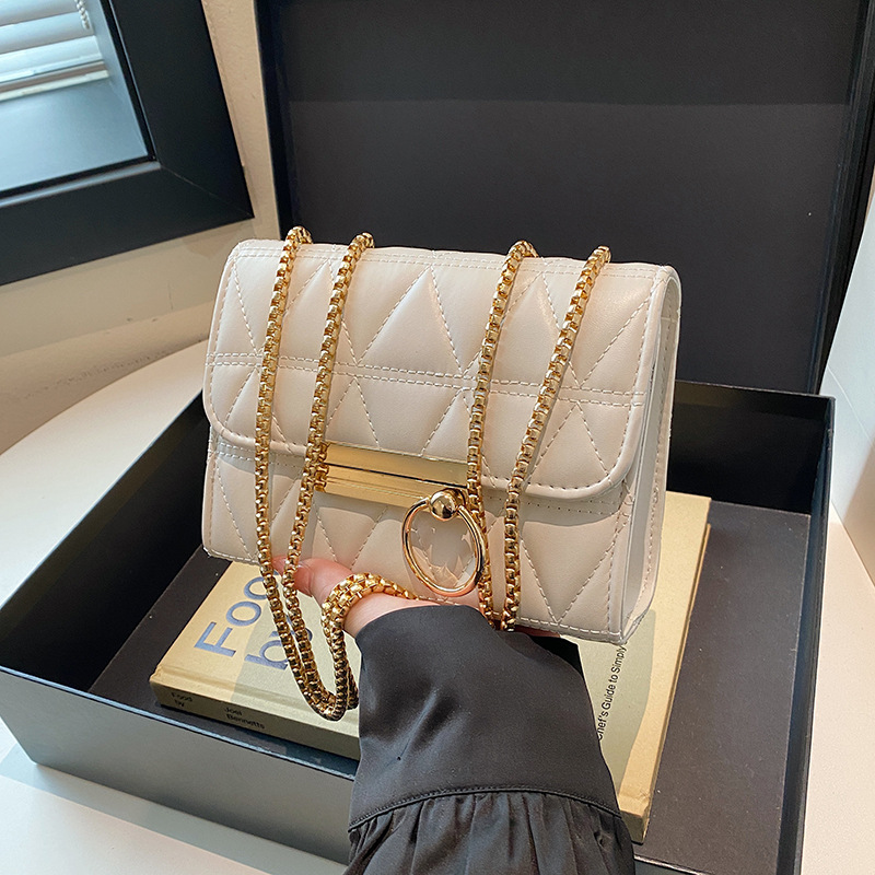 2024 invierno nuevo triángulo auto personalidad costura de cadena de color sólido bolso de moda de hombro sólido bolso de tramo inclinado