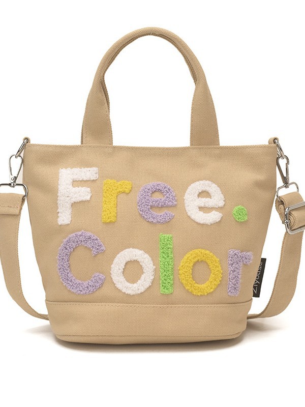 Mamá bolso para salir bolso de cubo de mano mujer 2026 nuevo bolso de lona bordado de dibujos animados letras casuales bolso de mochila