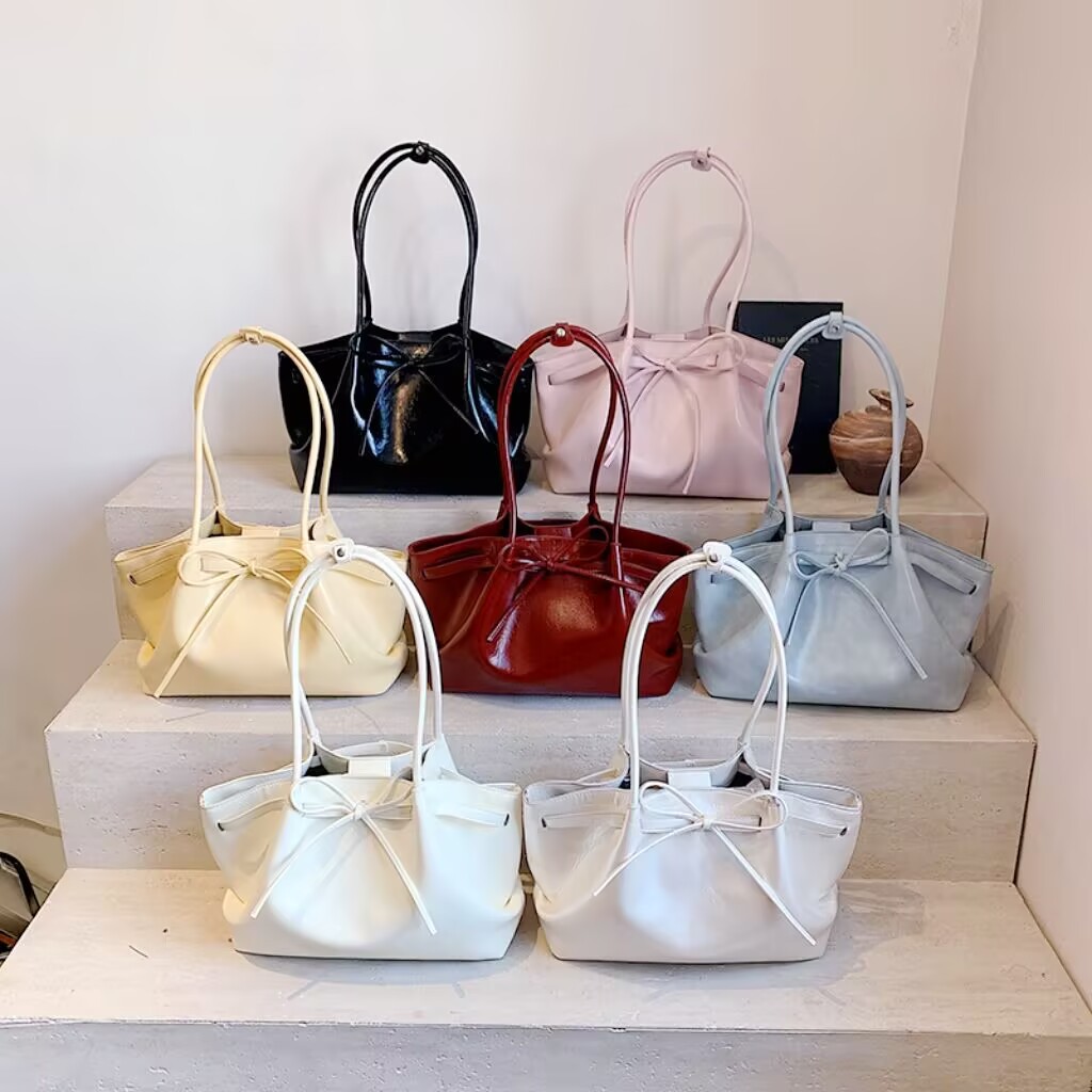 Bolsa de cesta de vegetais Niche para mulheres 2025 primavera nova moda bolsa tote doce laço de renda bolsa transversal.