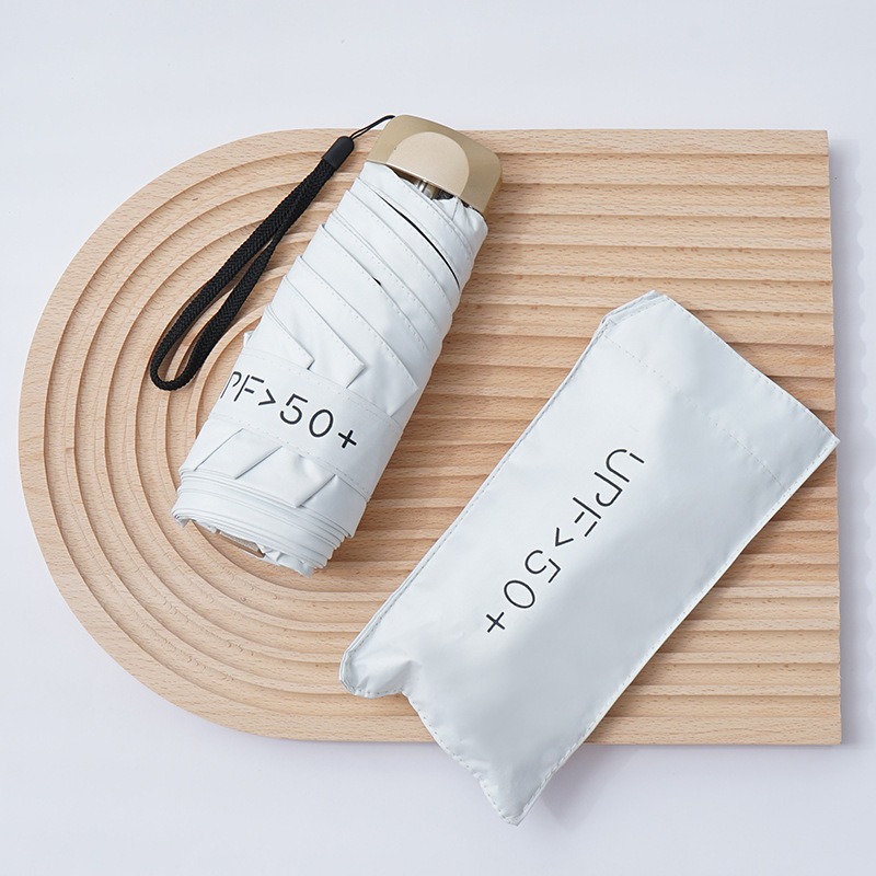 Cápsula paraguas protección solar Protección UV paraguas reforzado de ocho huesos paraguas cinco veces pequeña sombrilla portátil