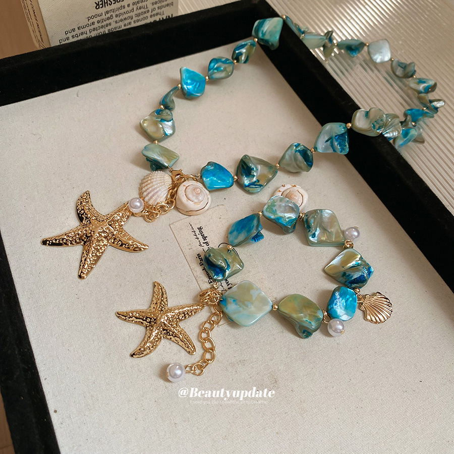Concha Concha Concha Estrella de mar Juego de collar de perlas Estilo de vacaciones junto al mar Temperamento Cadena de clavícula Moda Collar de todo fósforo al por mayor