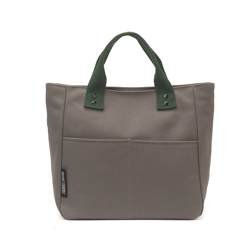 Bolsa de mujer 2026 nuevo bolso de lona de viaje multibolsillo bolso de bolsa de publicidad logotipo impresa en stock