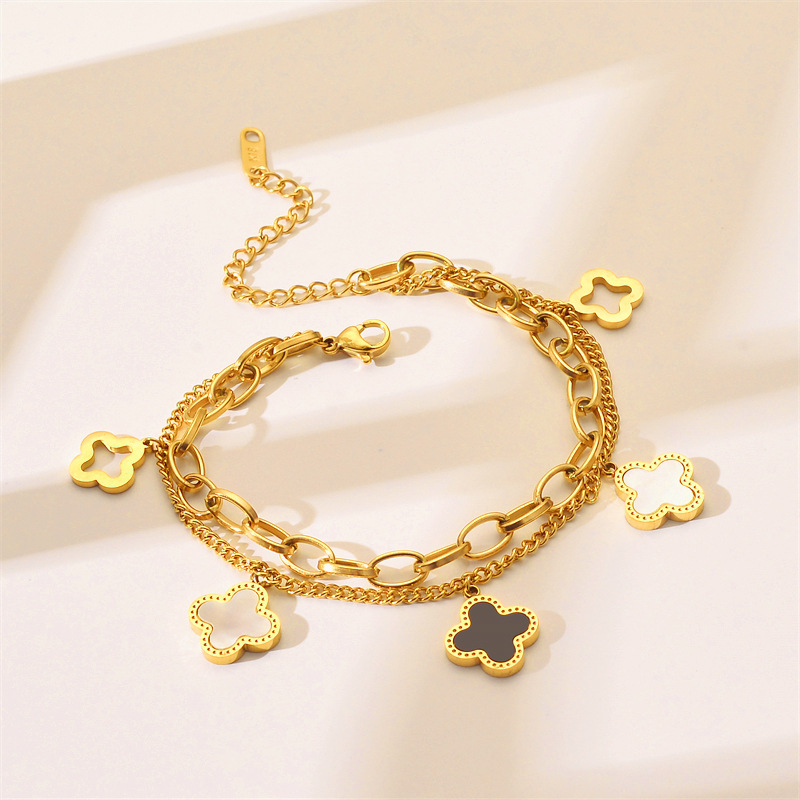 Comercio exterior nuevo estilo coreano de acero de titanio pulsera de cadena de doble hoja de cuatro hojas de diseño de nicho de gama alta no se desvanece joyas de mano