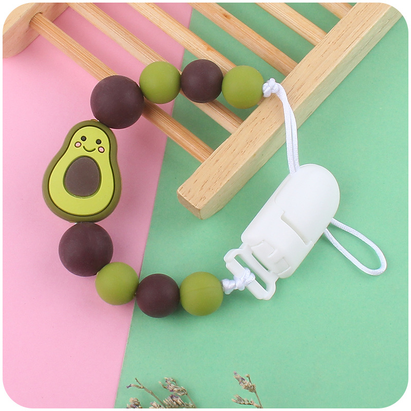 Suministros para bebés de dibujos animados fruta chupete cadena calmante bebé de silicona sandía mordedura molar anti-gota cadena Nuevo