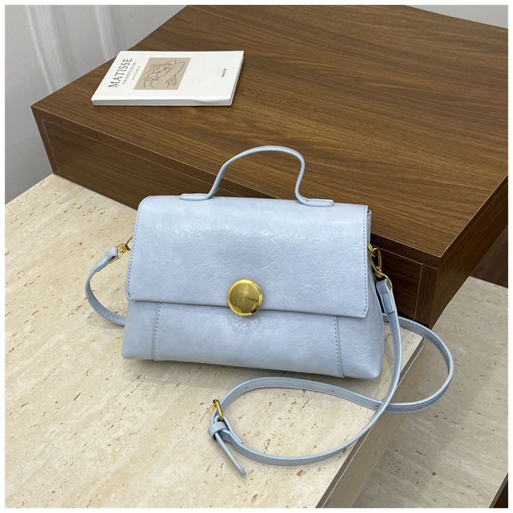 Bolso de mano de alta sensación para mujeres 2026 verano nuevo nicho de lujo ligero bolso cuadrado retrógrado ocio mochila de hombro