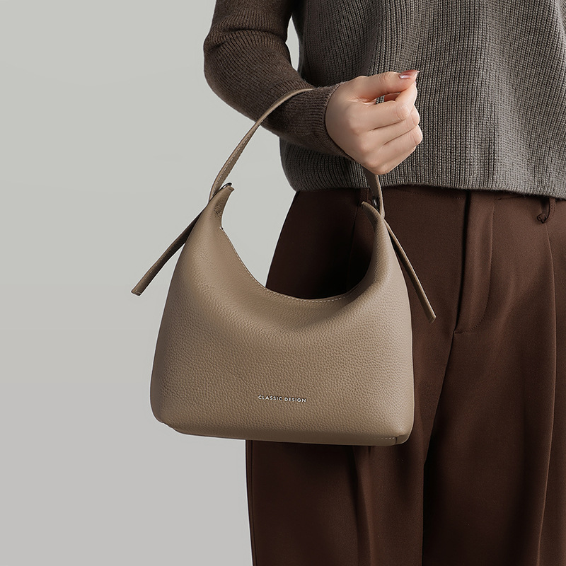 Bolso de mujer 2026 nuevo bolso de mujer verano de cuero bolsa de mano cesta de moda versátil mochila de hombro