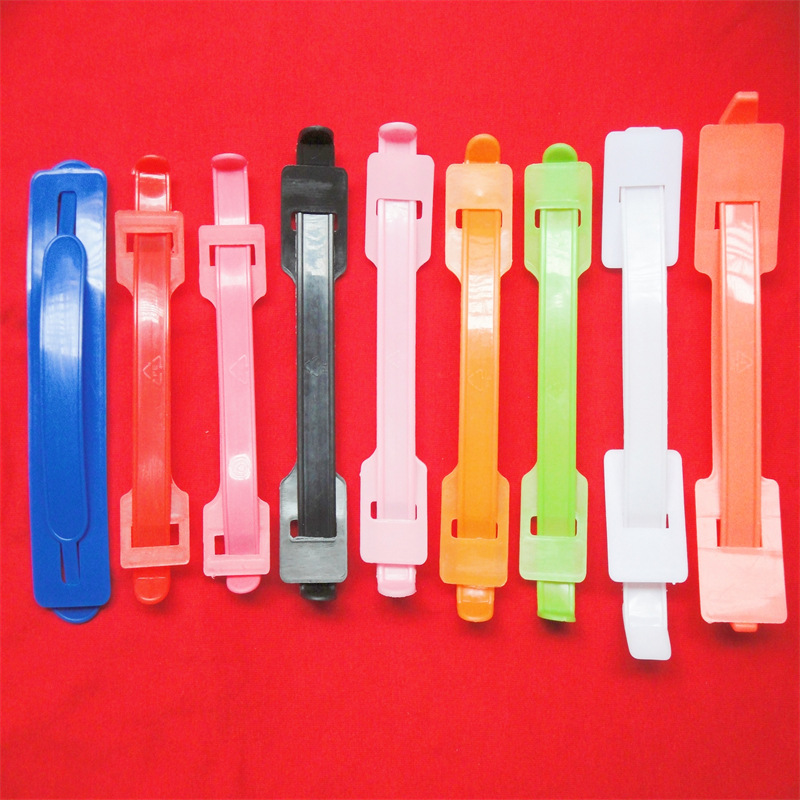 厂家塑料提手手提扣 书带提手 纸箱包装配件 书袋奶箱提手纸箱扣