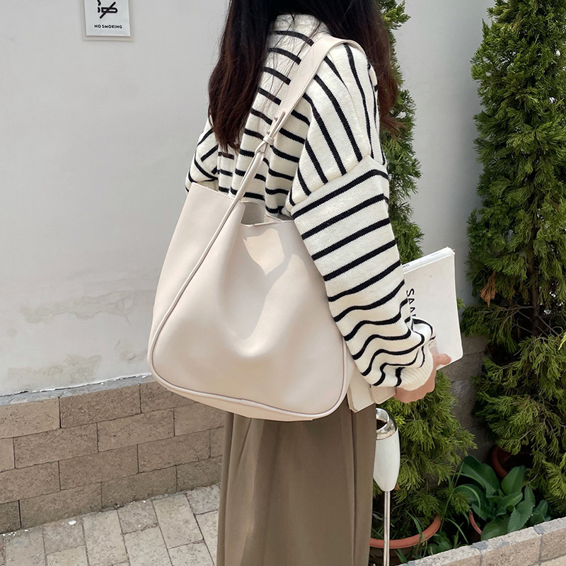 Darong women's bag 2023 new fashionable retro work commuter tote bag, niche single shoulder armpit bag versatile_voghion.com
