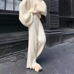 ニットの厚い穴の広い足のズボンの女性の秋の冬の高腰はやせています。